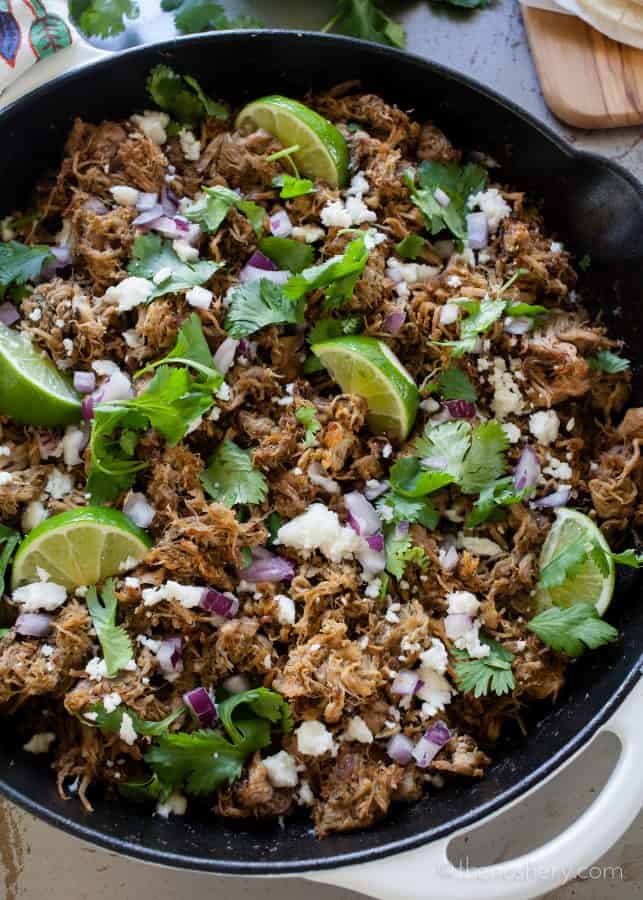 Slow Cooker Pork Carnitas Recipe | Make taco night a special night! Ditch the ground beef with the taco seasoning and try these easy and flavorful slow cooker pork tacos. | The Noshery