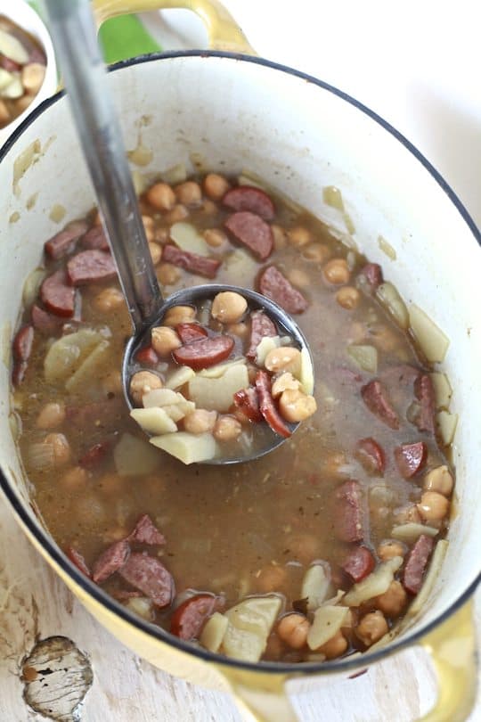 Spanish Bean Soup | Savory soup of garbanzo beans, potatoes and spicy sausage in a chicken broth. | TheNoshery.com - @TheNoshery