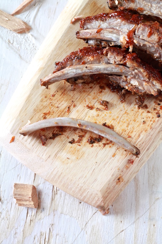 Spicy BBQ Oven Smoked Ribs | Hot and spicy baby back ribs smoked in the oven. Perfect for game day! | TheNoshery.com - @thenoshery