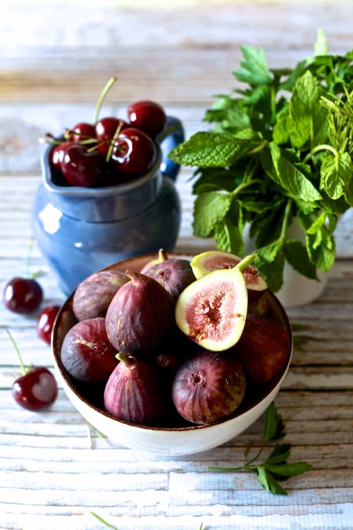 Grilled Skirt Steak with Roasted Cherries and Figs with Crispy Onions | The Noshery