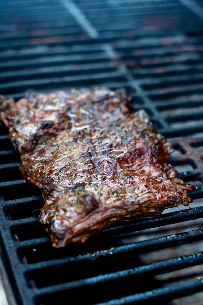 Grilled Skirt Steak with Roasted Cherries and Figs with Crispy Onions | The Noshery