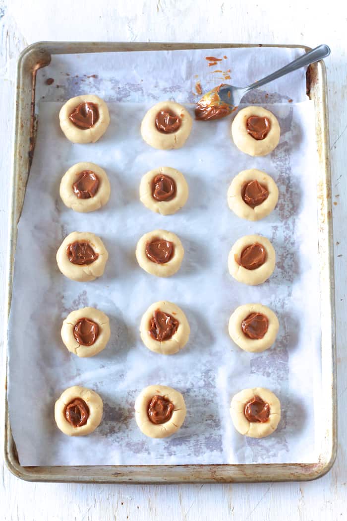 Dulce De Leche Thumbprint Cookies - TheNoshery.com