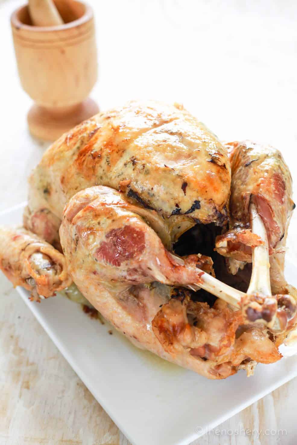 Puerto Rican Thanksgiving Turkey: Pavochon - Turkey seasoned to tasted like pork. Roasted breast down for a fool proof juicy and flavorful breast. | TheNoshery.com