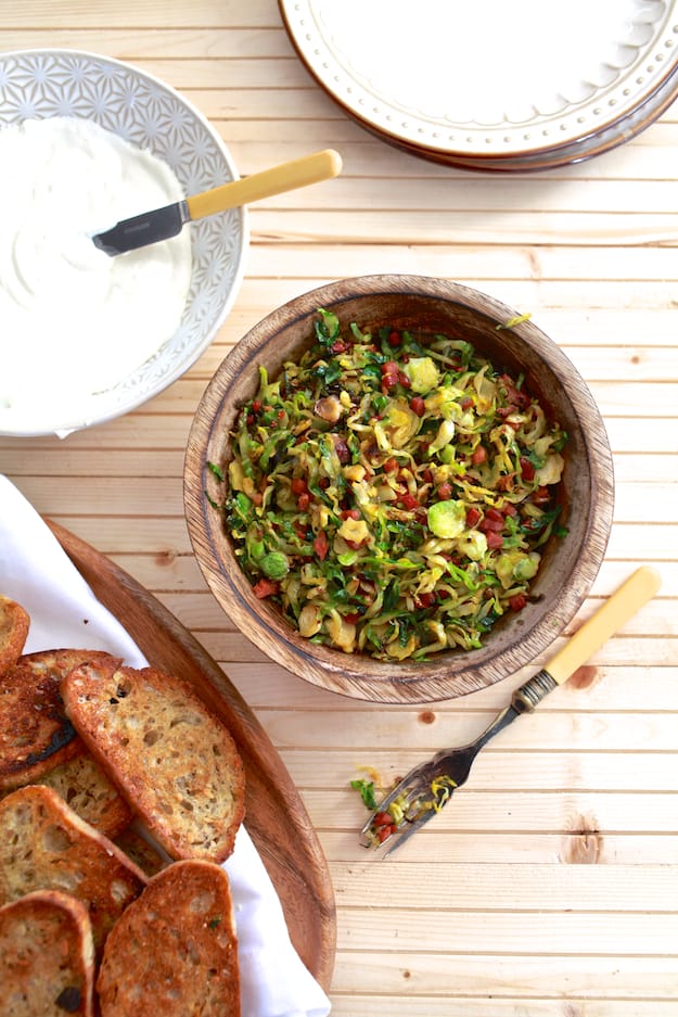 Brussels Sprouts and Ricotta Toast | Hearty toast topped with whipped ricotta cheese, shaved brussels sprouts and pancetta. | TheNoshery.com - @thenoshery