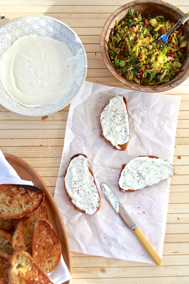 Brussels Sprouts and Ricotta Toast | Hearty toast topped with whipped ricotta cheese, shaved brussels sprouts and pancetta. | TheNoshery.com - @thenoshery