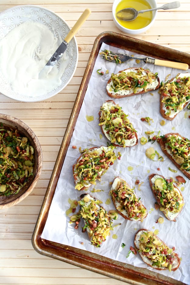 Brussels Sprouts and Ricotta Toast | Hearty toast topped with whipped ricotta cheese, shaved brussels sprouts and pancetta. | TheNoshery.com - @thenoshery