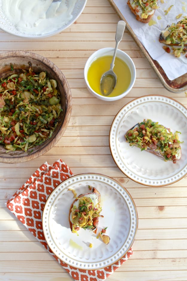 Brussels Sprouts and Ricotta Toast | Hearty toast topped with whipped ricotta cheese, shaved brussels sprouts and pancetta.