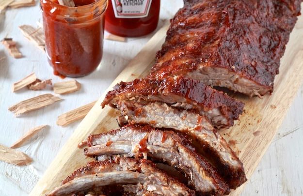 Spicy BBQ Oven Smoked Ribs | Hot and spicy baby back ribs smoked in the oven. Perfect for game day! | TheNoshery.com - @thenoshery