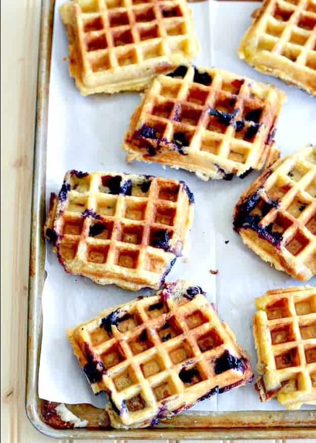 Bread Pudding Waffles with Blueberries and Lemon Curd - The Noshery