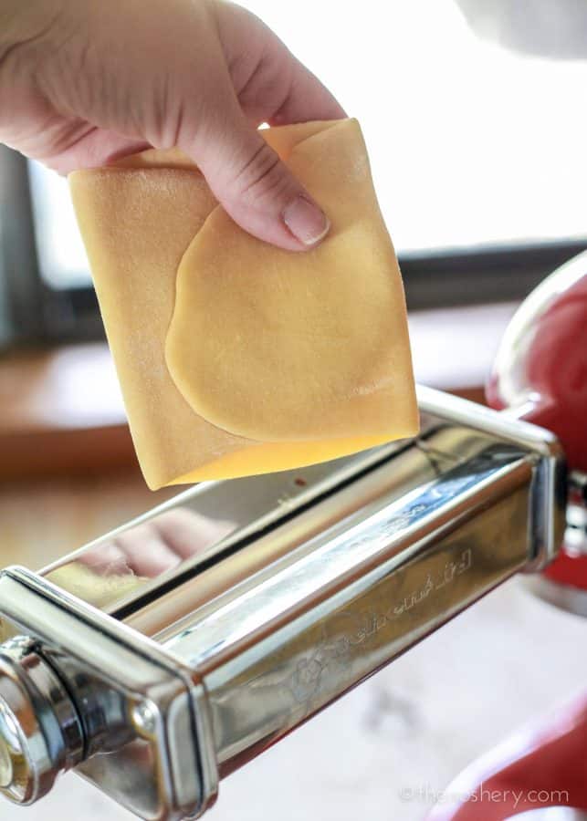 Homemade Pasta | Feeding fresh pasta into pasta roller. | The Noshery