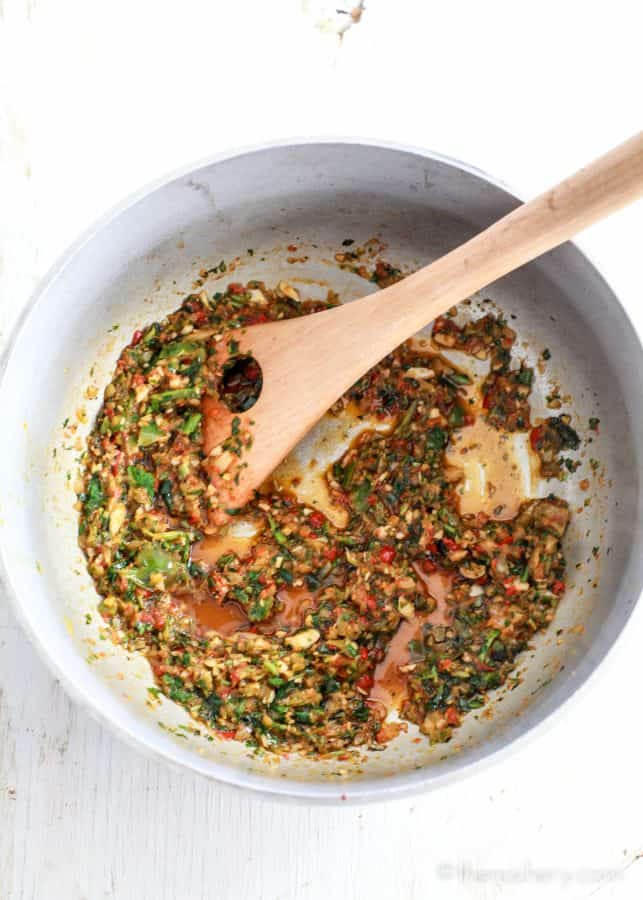 Arroz con Gandules (Puerto Rican Style Rice and Pigeon Peas) | Skillet of sautéed cilantro, onions, garlic and bell pepper. 