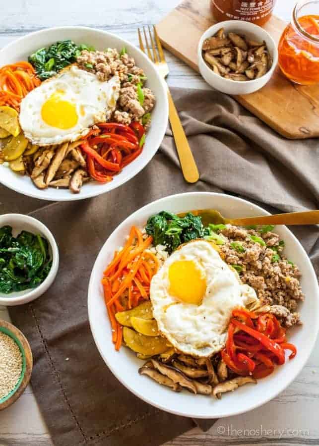 Overhead shots of Ground Pork Bulgogi + Cauliflower Rice | Sautéed vegetables, with a fried egg, and ground pork