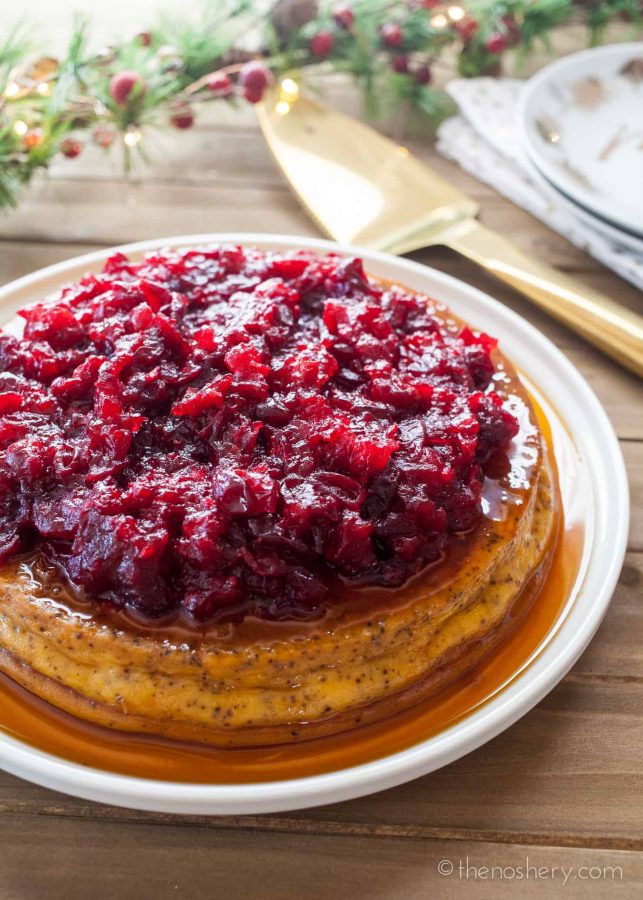 Chai Spiced Orange Flan with Cranberry Compote | Creamy cheese flan spiced with chai and orange and then topped with a sweet and tart cranberry compote. A perfect holiday dessert! | The Noshery