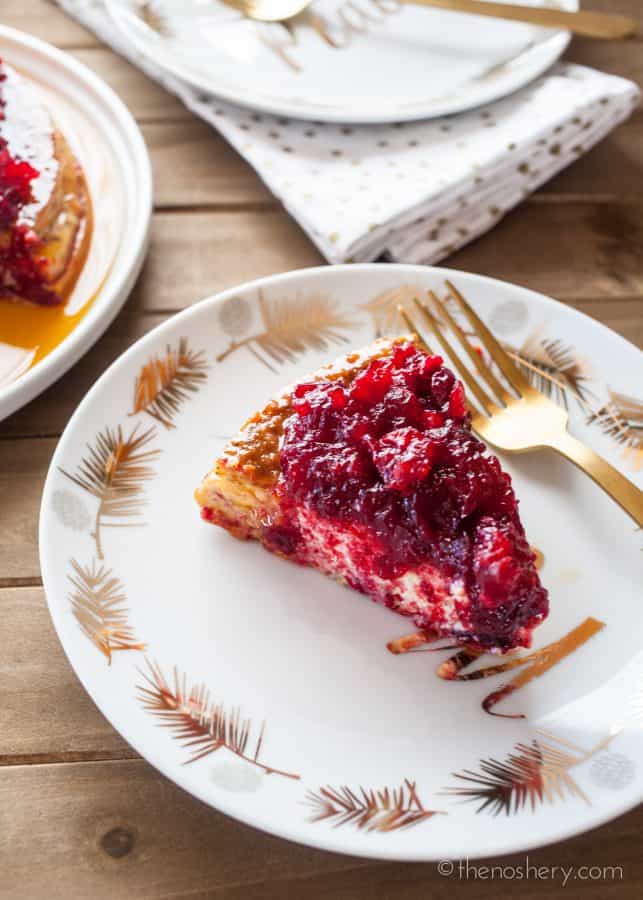 Chai Spiced Orange Flan with Cranberry Compote | Creamy cheese flan spiced with chai and orange and then topped with a sweet and tart cranberry compote. A perfect holiday dessert! | The Noshery