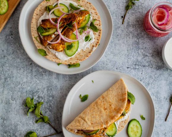 Chicken Shawarma Pitas | These chicken pitas are an adaptation of the popular middle eastern street food shawarma. The chicken tenderloins are rubbed with shawarma spices and served in a warm pita with tangy yogurt. This flavor bomb is a perfect weeknight meal | The Noshery