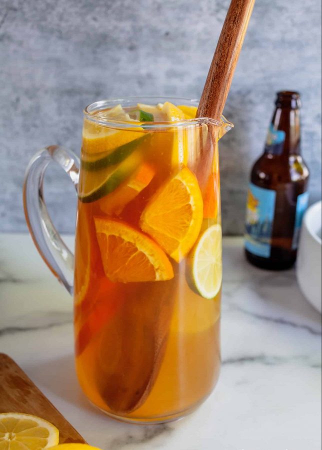 Summer Shandy Sangria | A combination of beer, lemonade, and fresh fruit is the marriage of two favorite summer drinks, shandy and sangria. | The Noshery