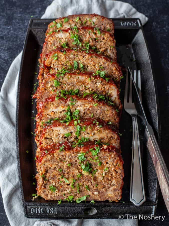 The Best Classic Meatloaf Recipe | Every kitchen needs a classic meatloaf recipe. This easy dinner comes out of the oven tender, flavorful, and filling with a delicious topping. | The Noshery