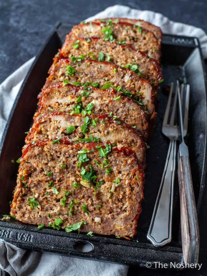 The Best Classic Meatloaf Recipe | Every kitchen needs a classic meatloaf recipe. This easy dinner comes out of the oven tender, flavorful, and filling with a delicious topping. | The Noshery