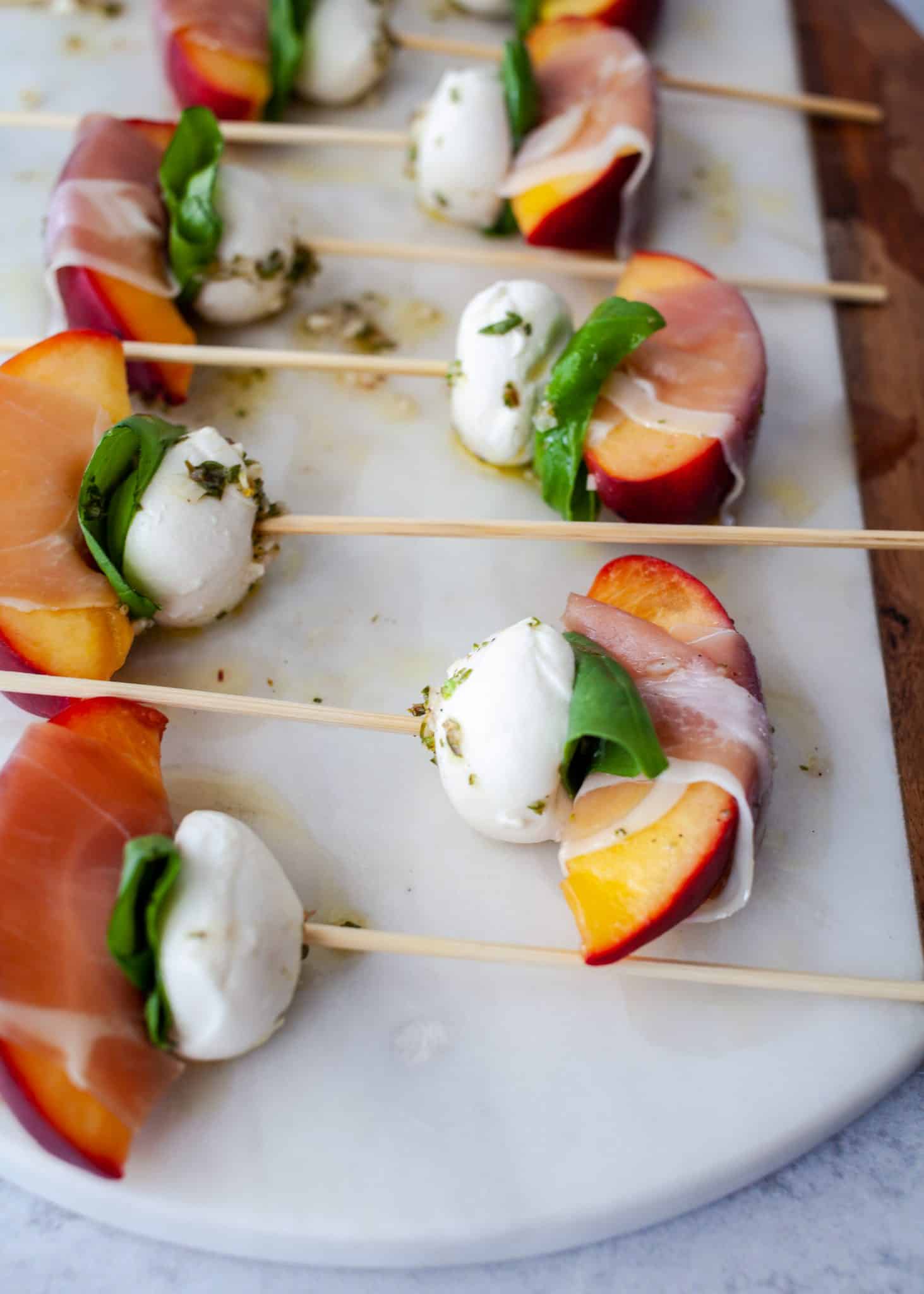 Mozzarella, Prosciutto, and Pickled Peach Appetizer Skewers - The Noshery